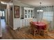 Bright dining area with wood-look floors and a table for four at 1785 Quail Hill Dr, Lakeland, FL 33810