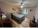 Bright bedroom featuring a comfy bed and ample floor space at 1785 Quail Hill Dr, Lakeland, FL 33810