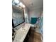 Clean bathroom with a large vanity and a shower/tub combo at 1785 Quail Hill Dr, Lakeland, FL 33810