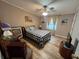 Bright bedroom featuring a comfy bed and ample floor space at 1785 Quail Hill Dr, Lakeland, FL 33810