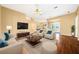 Spacious living room with hardwood floors, featuring a neutral color palette at 2172 Nw 50Th Cir, Ocala, FL 34482