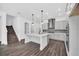 Modern kitchen with gray cabinets and a large island at 13032 Sunrise Harvest Dr, Winter Garden, FL 34787