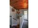Unique staircase with wood flooring and a decorative chandelier at 2955 Lolissa Ln, Winter Park, FL 32789