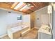 Spa-like bathroom with a large soaking tub, walk-in shower, and double vanity at 2955 Lolissa Ln, Winter Park, FL 32789