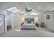 Bright and airy main bedroom with high ceilings, skylights, and a plush bed at 2955 Lolissa Ln, Winter Park, FL 32789