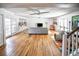 Finished basement with hardwood floors, a large sofa, and musical instruments at 2955 Lolissa Ln, Winter Park, FL 32789