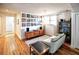 Cozy Gathering room featuring hardwood floors and mid century modern furniture at 2955 Lolissa Ln, Winter Park, FL 32789