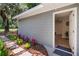 Gray house exterior with a landscaped walkway at 4790 Anderson Rd, Orlando, FL 32812
