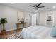 Main bedroom with wood-look floors and ensuite bathroom at 4790 Anderson Rd, Orlando, FL 32812