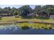Aerial view showcasing lakefront property and home at 4790 Anderson Rd, Orlando, FL 32812