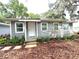 Charming gray house with a manicured front yard at 4790 Anderson Rd, Orlando, FL 32812