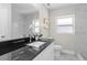 Clean bathroom with granite countertop and white cabinets at 4790 Anderson Rd, Orlando, FL 32812