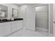 Modern bathroom with double vanity, granite countertop, and large closet at 4790 Anderson Rd, Orlando, FL 32812