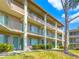 Two-story building with balconies and landscaping at 115 Oyster Bay Cir # 340, Altamonte Springs, FL 32701