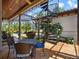 Covered patio with spiral staircase and outdoor dining area at 1911 Lake Markham Preserve Trl, Sanford, FL 32771