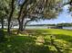 Spacious waterfront lot with mature trees and lake access at 1911 Lake Markham Preserve Trl, Sanford, FL 32771