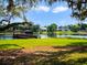 Private boat dock with covered seating area on a lake at 1911 Lake Markham Preserve Trl, Sanford, FL 32771
