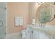 Elegant bathroom with marble vanity, walk-in shower, and frameless glass enclosure at 1911 Lake Markham Preserve Trl, Sanford, FL 32771