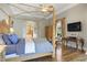 Spacious main bedroom with hardwood floors and ensuite bathroom access at 1911 Lake Markham Preserve Trl, Sanford, FL 32771