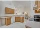 Open kitchen with ample counter space and wood cabinets at 1112 Royal Marquis Cir, Ocoee, FL 34761