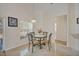 Bright breakfast nook with table and four chairs, ideal for small meals at 1112 Royal Marquis Cir, Ocoee, FL 34761