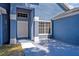Exterior view of a light blue house with a white door and walkway at 1112 Royal Marquis Cir, Ocoee, FL 34761