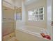 Relaxing bathroom featuring a garden tub and walk-in shower at 1112 Royal Marquis Cir, Ocoee, FL 34761