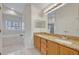 Elegant bathroom with granite countertops and double vanity at 1112 Royal Marquis Cir, Ocoee, FL 34761