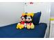 bedroom with twin bed featuring Mickey Mouse themed decor at 4731 Clock Tower Dr # 101, Kissimmee, FL 34746