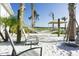 Relaxing hammock area near the lake at 4731 Clock Tower Dr # 101, Kissimmee, FL 34746