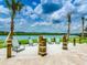 Relaxing beach area with lounge chairs at 4731 Clock Tower Dr # 101, Kissimmee, FL 34746