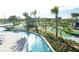 Aerial view shows a large lazy river and mini golf course at 4731 Clock Tower Dr # 101, Kissimmee, FL 34746