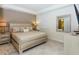 Spacious Primary bedroom with a king-size bed and neutral decor at 4731 Clock Tower Dr # 101, Kissimmee, FL 34746