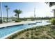 Community features a relaxing lazy river with lounge chairs at 4731 Clock Tower Dr # 101, Kissimmee, FL 34746