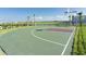 Outdoor basketball court with new surfacing at 4731 Clock Tower Dr # 101, Kissimmee, FL 34746
