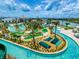 Aerial view of community pool, lazy river, and mini golf at 4731 Clock Tower Dr # 101, Kissimmee, FL 34746
