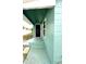 Quaint front porch with teal painted exterior at 2015 1/2 Laurel St, Bartow, FL 33830