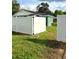 White vinyl fence surrounds the backyard at 2015 1/2 Laurel St, Bartow, FL 33830