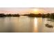 Peaceful lake view at sunset, showcasing waterfront property at 1305 W Lake Mary Blvd, Lake Mary, FL 32746