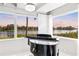 Bright living room with lake views and grand piano at 1305 W Lake Mary Blvd, Lake Mary, FL 32746