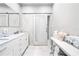Spa-like bathroom with marble and barn door at 1305 W Lake Mary Blvd, Lake Mary, FL 32746