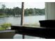 Scenic view of a tranquil lake with houses at 1305 W Lake Mary Blvd, Lake Mary, FL 32746