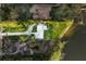 Aerial view showcasing home's location, landscape, and lake access at 1305 W Lake Mary Blvd, Lake Mary, FL 32746
