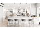 Modern white kitchen with stainless steel appliances and marble countertops at 1305 W Lake Mary Blvd, Lake Mary, FL 32746