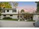 Modern home's exterior features a covered entryway and landscaping at 1305 W Lake Mary Blvd, Lake Mary, FL 32746