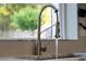 Modern gooseneck faucet in kitchen sink at 1305 W Lake Mary Blvd, Lake Mary, FL 32746