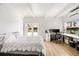 Bedroom with a bed, desk, and water view at 1305 W Lake Mary Blvd, Lake Mary, FL 32746