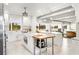 Modern white kitchen with marble countertops and stainless steel appliances at 1305 W Lake Mary Blvd, Lake Mary, FL 32746