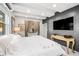 Spacious bedroom with large TV and comfy bed at 1305 W Lake Mary Blvd, Lake Mary, FL 32746