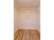 Large walk-in closet with wire shelving and wood flooring at 965 Tuskawilla Rd, Winter Springs, FL 32708